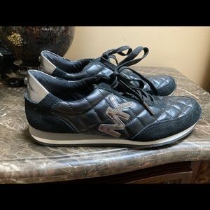 Michael Kors Black Sneakers with Silver MK Accent
